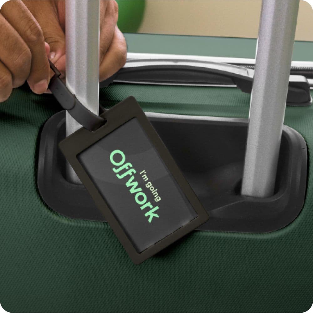 Suitcase with tag saying I'm going Offwork